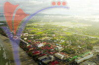 Aerial View of Chenang Beach, Langkawi And Village Surrounding After Sunrise.