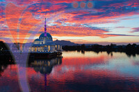 Scenic View of Floating Mosque On River With Sunset Background