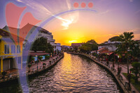 Canal And The Old Town in Melaka, Or Malacca, Malaysia At Dusk